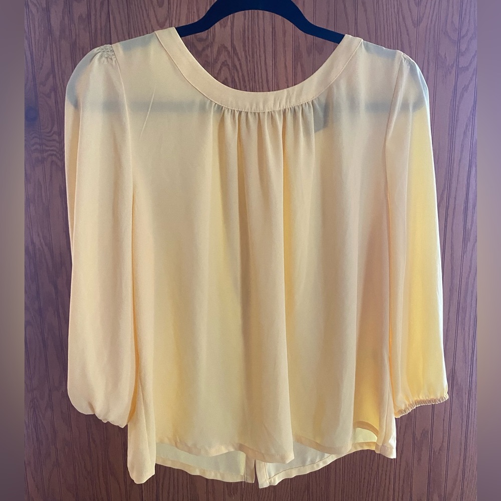 Yellow 7TH Avenue Design Studio New York & Company 100% polyester blouse.